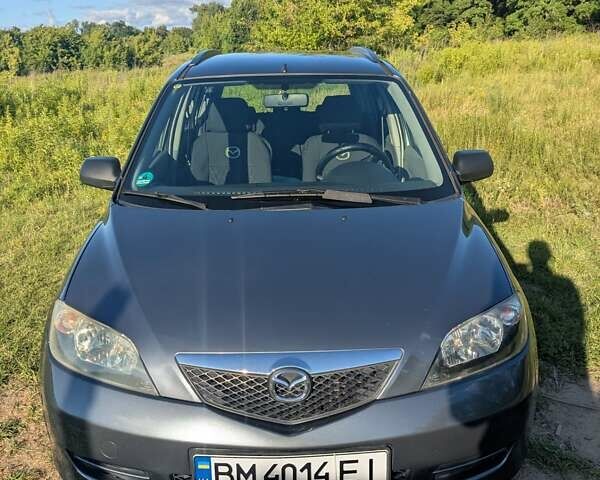 Серый Мазда 2, объемом двигателя 1.4 л и пробегом 187 тыс. км за 5500 $, фото 3 на Automoto.ua