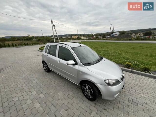 Серый Мазда 2, объемом двигателя 1.4 л и пробегом 322 тыс. км за 3700 $, фото 4 на Automoto.ua