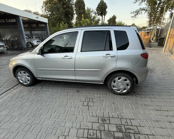 Серый Мазда 2, объемом двигателя 1.39 л и пробегом 126 тыс. км за 4700 $, фото 1 на Automoto.ua