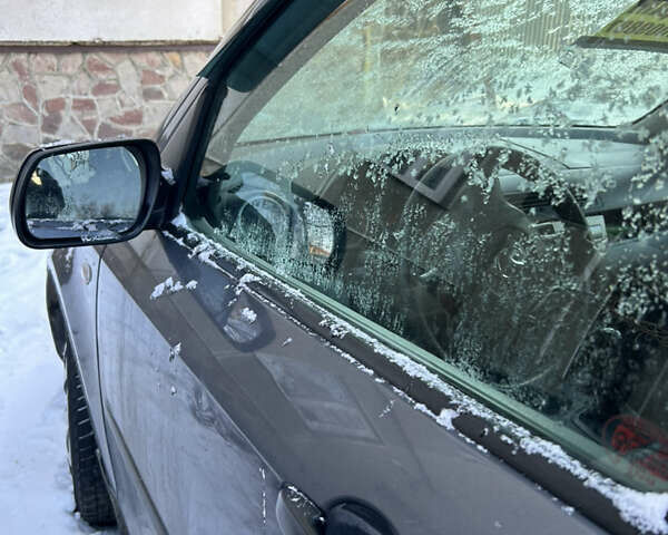 Серый Мазда 2, объемом двигателя 1.4 л и пробегом 200 тыс. км за 3200 $, фото 3 на Automoto.ua