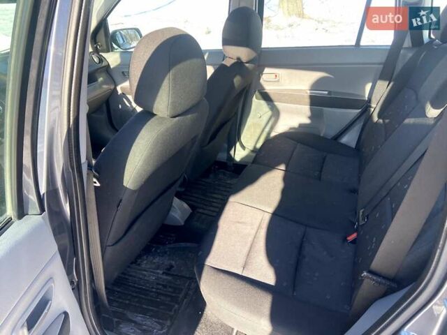 Серый Мазда 2, объемом двигателя 1.4 л и пробегом 253 тыс. км за 3300 $, фото 6 на Automoto.ua