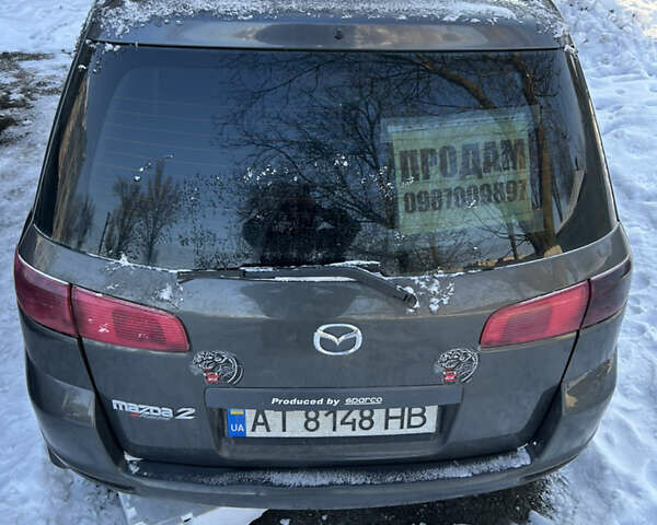 Серый Мазда 2, объемом двигателя 1.4 л и пробегом 200 тыс. км за 3200 $, фото 1 на Automoto.ua