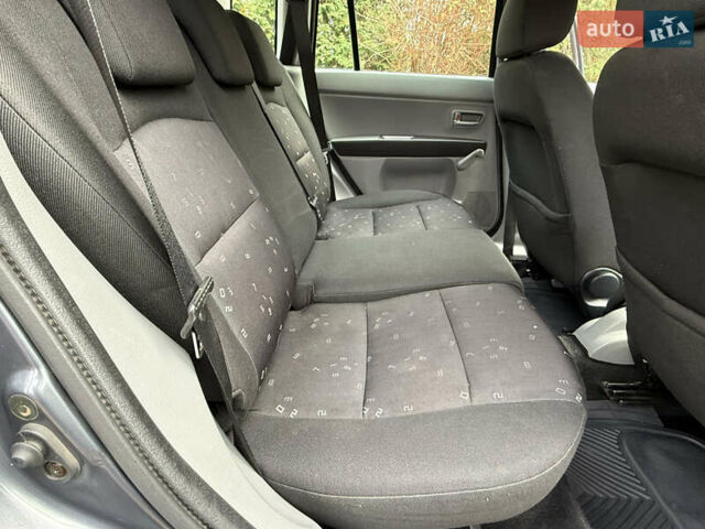 Серый Мазда 2, объемом двигателя 1.4 л и пробегом 247 тыс. км за 3350 $, фото 25 на Automoto.ua