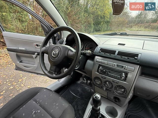 Серый Мазда 2, объемом двигателя 1.4 л и пробегом 247 тыс. км за 3350 $, фото 23 на Automoto.ua