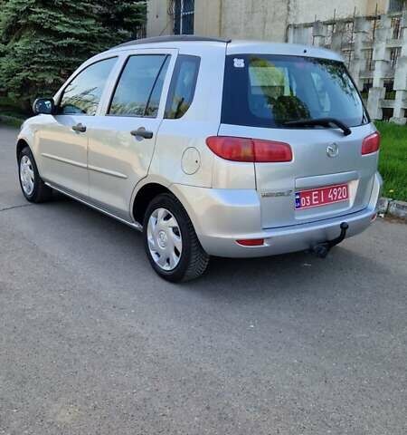 Сірий Мазда 2, об'ємом двигуна 1.4 л та пробігом 218 тис. км за 4900 $, фото 7 на Automoto.ua