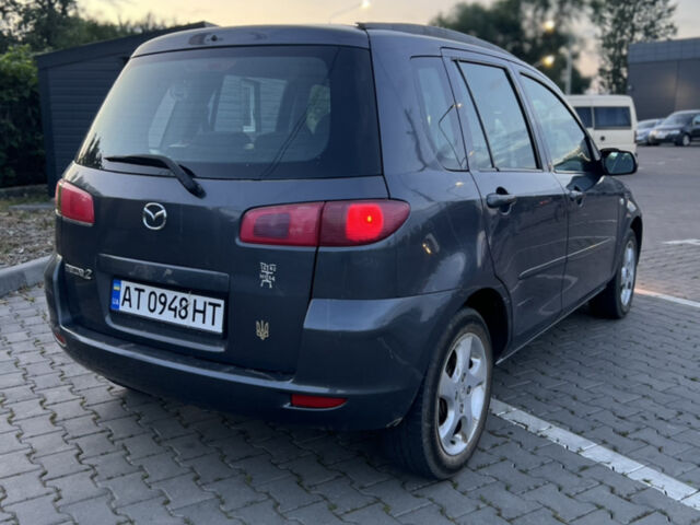 Сірий Мазда 2, об'ємом двигуна 1.39 л та пробігом 259 тис. км за 3750 $, фото 11 на Automoto.ua