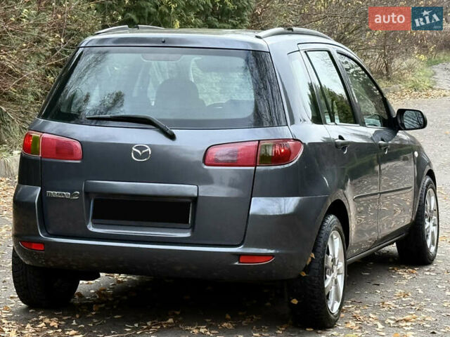 Серый Мазда 2, объемом двигателя 1.4 л и пробегом 247 тыс. км за 3350 $, фото 10 на Automoto.ua