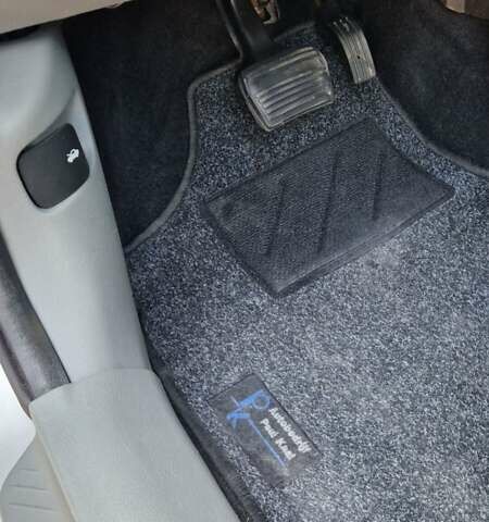 Сірий Мазда 2, об'ємом двигуна 1.4 л та пробігом 218 тис. км за 4900 $, фото 15 на Automoto.ua