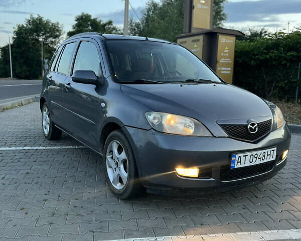 Серый Мазда 2, объемом двигателя 1.39 л и пробегом 220 тыс. км за 3750 $, фото 12 на Automoto.ua