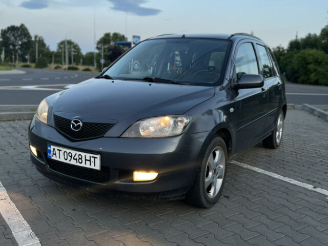 Сірий Мазда 2, об'ємом двигуна 1.39 л та пробігом 259 тис. км за 3750 $, фото 14 на Automoto.ua