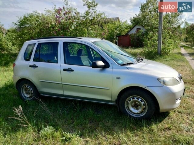 Сірий Мазда 2, об'ємом двигуна 1.4 л та пробігом 290 тис. км за 3500 $, фото 4 на Automoto.ua