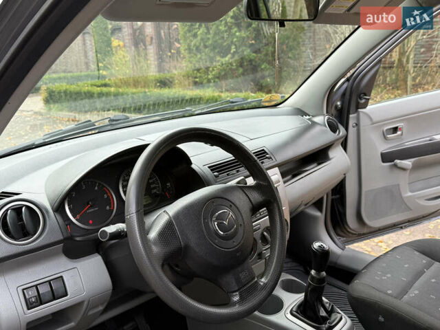 Серый Мазда 2, объемом двигателя 1.4 л и пробегом 247 тыс. км за 3350 $, фото 14 на Automoto.ua