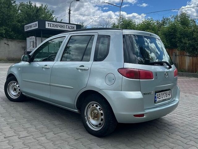 Сірий Мазда 2, об'ємом двигуна 1.4 л та пробігом 262 тис. км за 2900 $, фото 3 на Automoto.ua