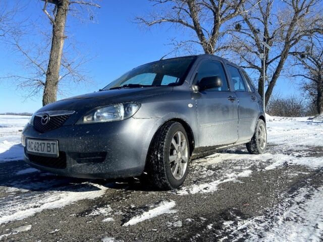 Сірий Мазда 2, об'ємом двигуна 1.4 л та пробігом 253 тис. км за 3300 $, фото 1 на Automoto.ua