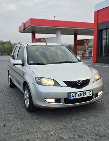 Сірий Мазда 2, об'ємом двигуна 1.4 л та пробігом 226 тис. км за 3950 $, фото 2 на Automoto.ua
