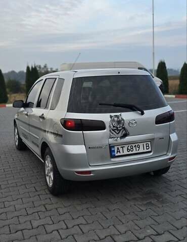 Сірий Мазда 2, об'ємом двигуна 1.4 л та пробігом 226 тис. км за 3950 $, фото 18 на Automoto.ua