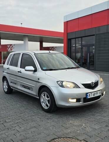 Сірий Мазда 2, об'ємом двигуна 1.4 л та пробігом 226 тис. км за 3950 $, фото 6 на Automoto.ua