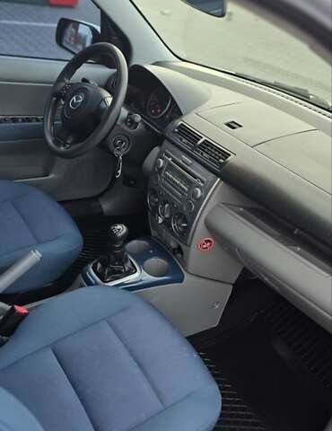 Сірий Мазда 2, об'ємом двигуна 1.4 л та пробігом 226 тис. км за 3950 $, фото 24 на Automoto.ua