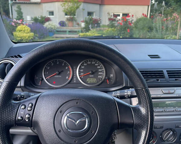 Сірий Мазда 2, об'ємом двигуна 1.39 л та пробігом 106 тис. км за 4600 $, фото 14 на Automoto.ua