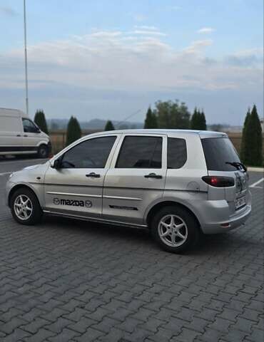 Сірий Мазда 2, об'ємом двигуна 1.4 л та пробігом 226 тис. км за 3950 $, фото 16 на Automoto.ua