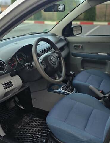 Сірий Мазда 2, об'ємом двигуна 1.4 л та пробігом 226 тис. км за 3950 $, фото 23 на Automoto.ua
