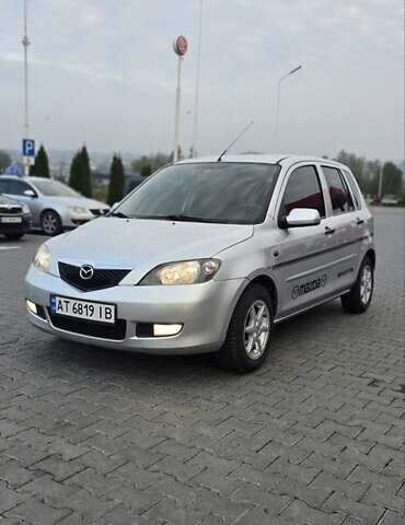Сірий Мазда 2, об'ємом двигуна 1.4 л та пробігом 226 тис. км за 3950 $, фото 1 на Automoto.ua