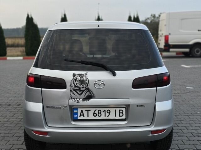 Сірий Мазда 2, об'ємом двигуна 1.4 л та пробігом 227 тис. км за 3950 $, фото 5 на Automoto.ua
