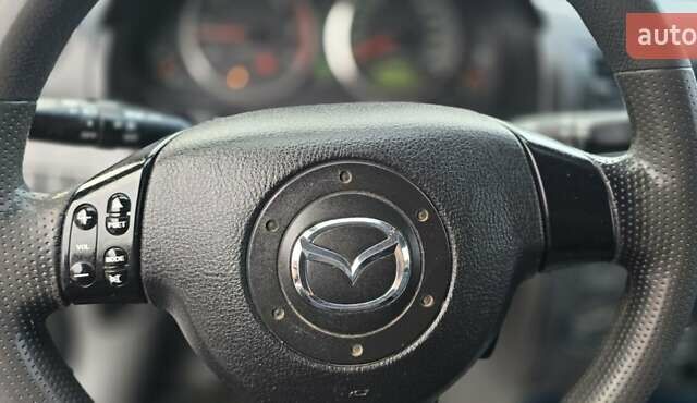 Сірий Мазда 2, об'ємом двигуна 1.4 л та пробігом 226 тис. км за 3950 $, фото 29 на Automoto.ua