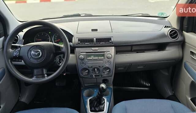 Сірий Мазда 2, об'ємом двигуна 1.4 л та пробігом 226 тис. км за 3950 $, фото 27 на Automoto.ua