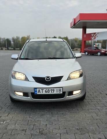 Сірий Мазда 2, об'ємом двигуна 1.4 л та пробігом 226 тис. км за 4350 $, фото 2 на Automoto.ua