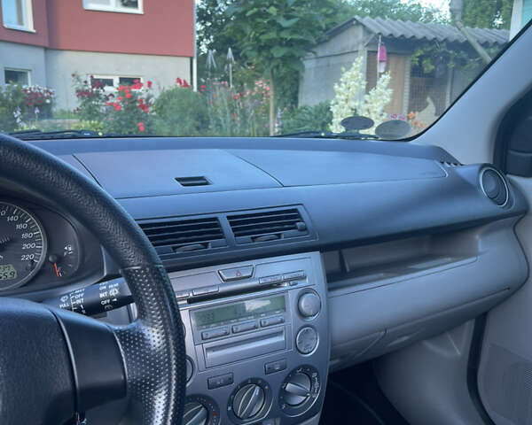 Сірий Мазда 2, об'ємом двигуна 1.39 л та пробігом 106 тис. км за 4600 $, фото 15 на Automoto.ua