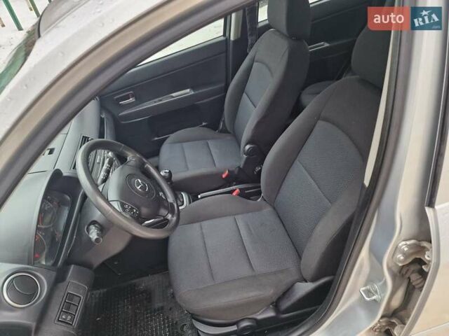 Серый Мазда 2, объемом двигателя 1.4 л и пробегом 166 тыс. км за 4150 $, фото 13 на Automoto.ua