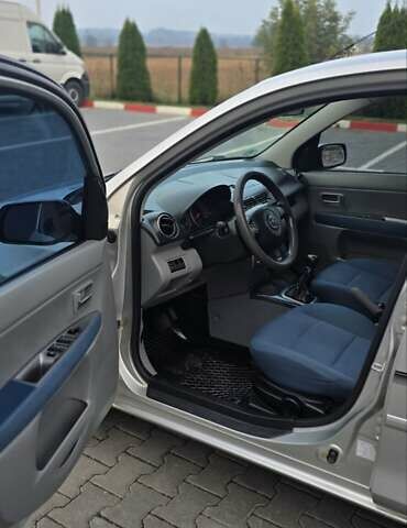 Сірий Мазда 2, об'ємом двигуна 1.4 л та пробігом 226 тис. км за 3950 $, фото 22 на Automoto.ua