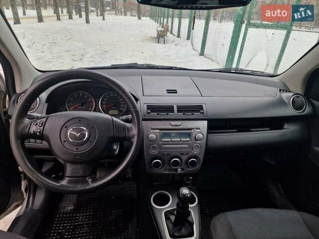 Серый Мазда 2, объемом двигателя 1.4 л и пробегом 166 тыс. км за 4150 $, фото 16 на Automoto.ua