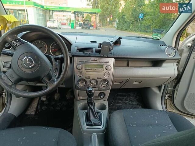 Сірий Мазда 2, об'ємом двигуна 1.2 л та пробігом 267 тис. км за 2500 $, фото 9 на Automoto.ua