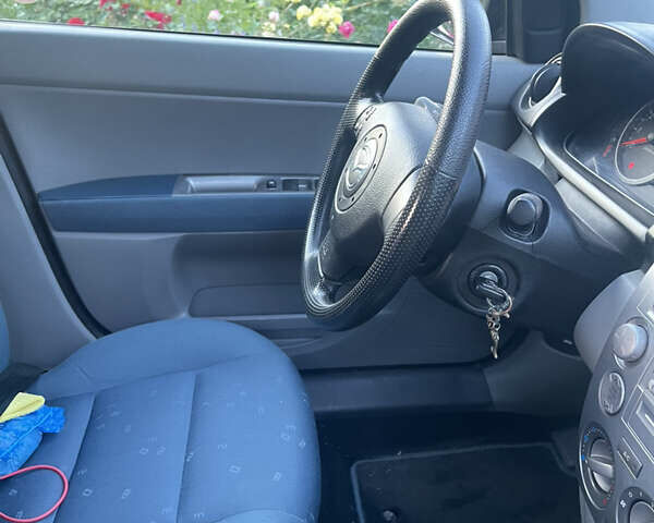 Сірий Мазда 2, об'ємом двигуна 1.39 л та пробігом 106 тис. км за 4600 $, фото 24 на Automoto.ua