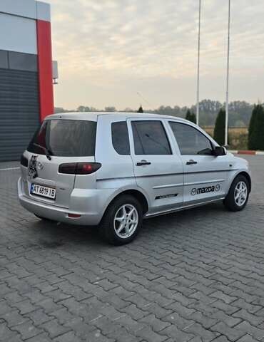Сірий Мазда 2, об'ємом двигуна 1.4 л та пробігом 226 тис. км за 4350 $, фото 1 на Automoto.ua