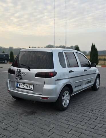 Сірий Мазда 2, об'ємом двигуна 1.4 л та пробігом 226 тис. км за 3950 $, фото 10 на Automoto.ua