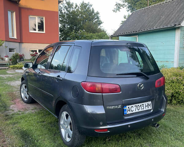 Сірий Мазда 2, об'ємом двигуна 1.39 л та пробігом 106 тис. км за 4600 $, фото 2 на Automoto.ua