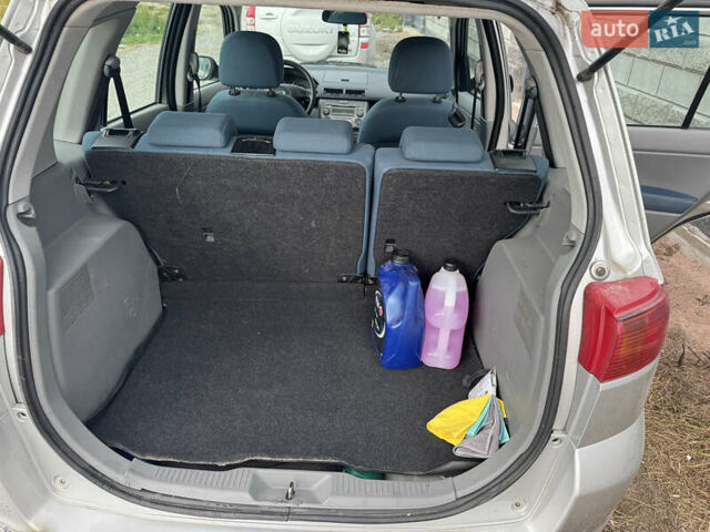 Серый Мазда 2, объемом двигателя 1.4 л и пробегом 204 тыс. км за 4000 $, фото 10 на Automoto.ua