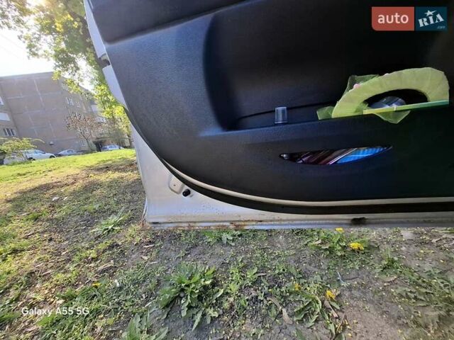 Серый Мазда 2, объемом двигателя 1.39 л и пробегом 150 тыс. км за 4800 $, фото 5 на Automoto.ua