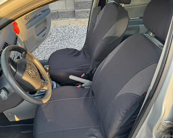 Серый Мазда 2, объемом двигателя 1.4 л и пробегом 204 тыс. км за 4000 $, фото 12 на Automoto.ua