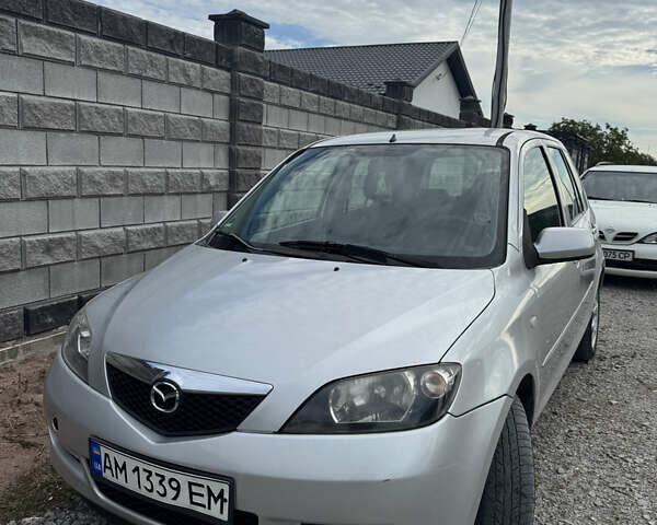 Серый Мазда 2, объемом двигателя 1.4 л и пробегом 204 тыс. км за 4000 $, фото 1 на Automoto.ua