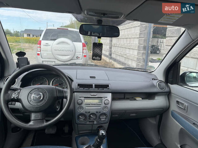 Серый Мазда 2, объемом двигателя 1.4 л и пробегом 204 тыс. км за 4000 $, фото 8 на Automoto.ua