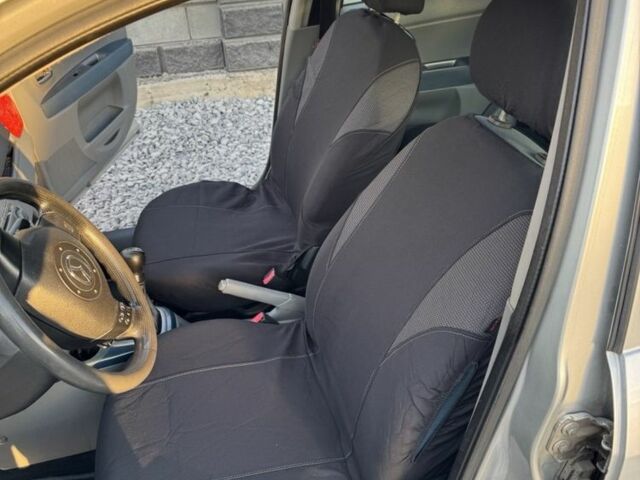 Сірий Мазда 2, об'ємом двигуна 1.39 л та пробігом 280 тис. км за 3300 $, фото 3 на Automoto.ua