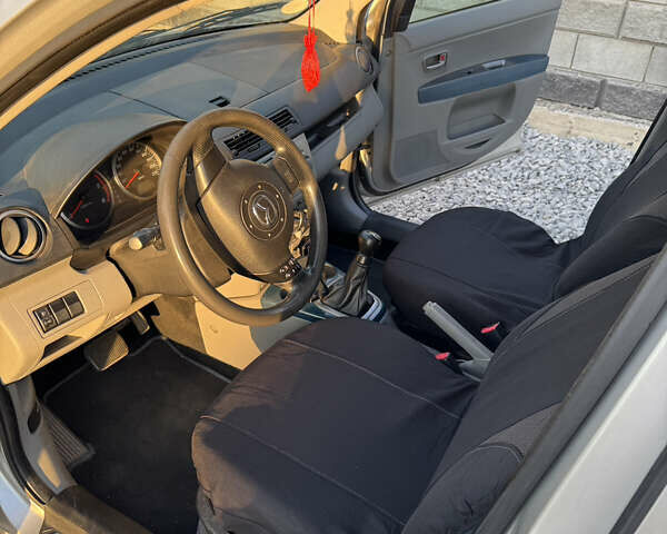 Серый Мазда 2, объемом двигателя 1.4 л и пробегом 204 тыс. км за 4000 $, фото 11 на Automoto.ua