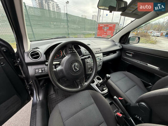 Серый Мазда 2, объемом двигателя 1.39 л и пробегом 177 тыс. км за 4700 $, фото 6 на Automoto.ua