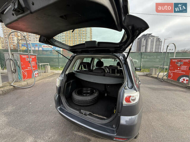 Серый Мазда 2, объемом двигателя 1.39 л и пробегом 177 тыс. км за 4700 $, фото 5 на Automoto.ua