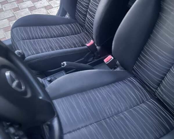 Сірий Мазда 2, об'ємом двигуна 1.35 л та пробігом 168 тис. км за 5300 $, фото 6 на Automoto.ua