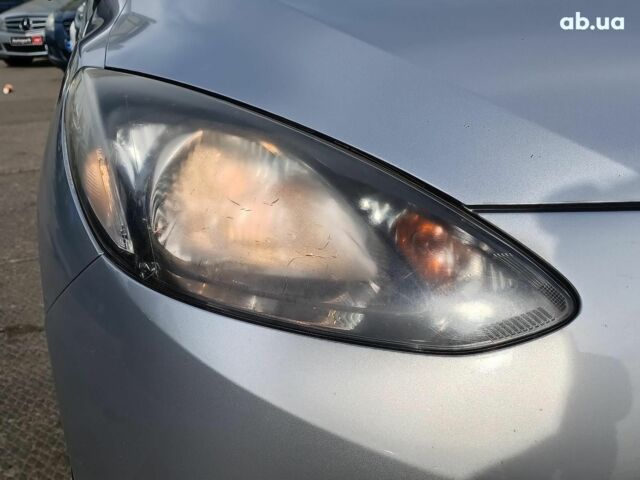 Серый Мазда 2, объемом двигателя 1.3 л и пробегом 168 тыс. км за 4990 $, фото 3 на Automoto.ua